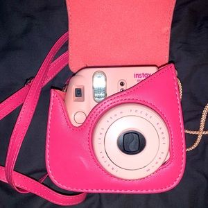 Baby pink Instax camera